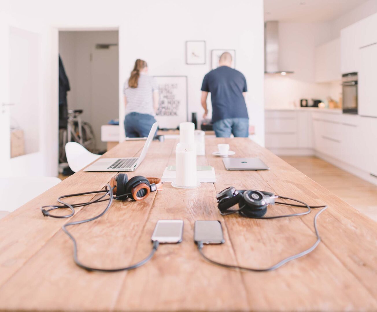 Headphone and laptops on desk